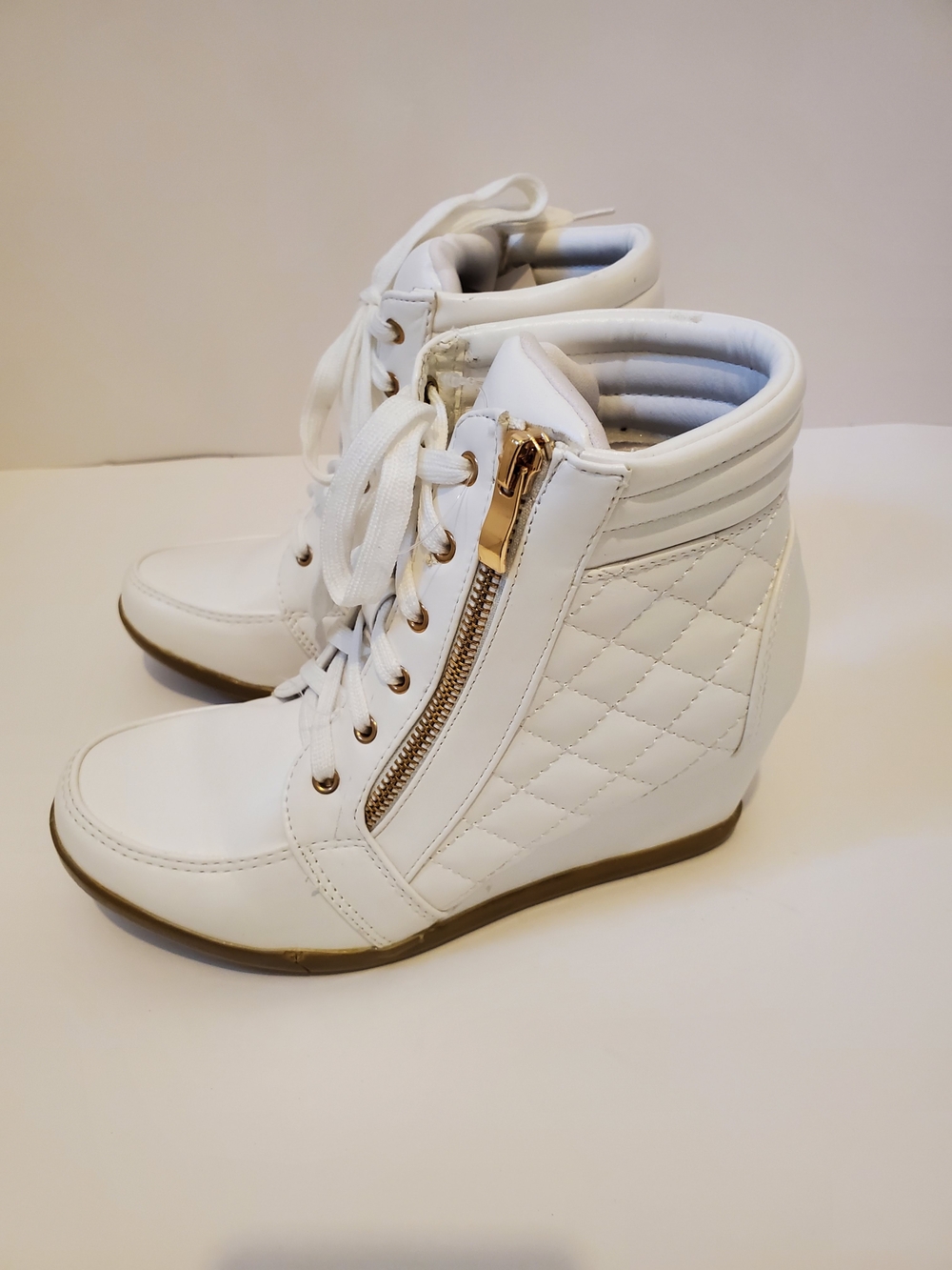White Quilted Wedge Sneaker with Gold Zipper